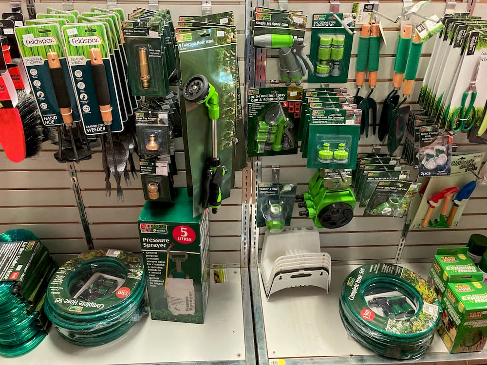 Hoses and hose fittings, garden tools, and other gardening products.
