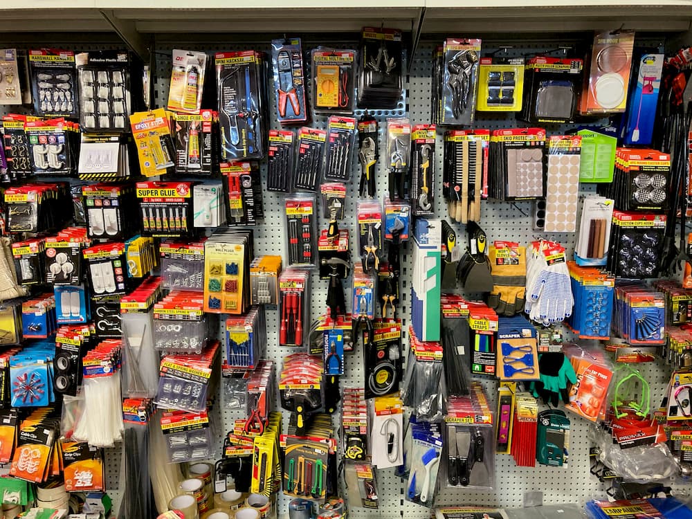 Tools, glue, picture frame hooks, home and vehicle maintenance items, and other hardware.