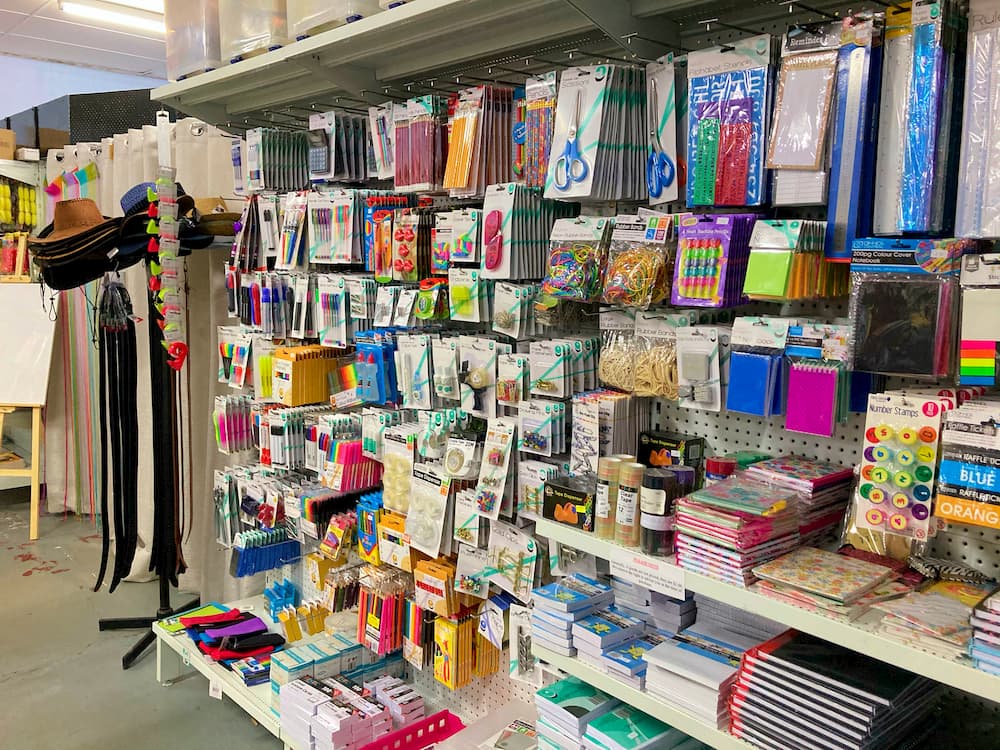 Hats and leather belts. Stationary products, including notebooks, pens, scissors, highlighters, sticky tape, stamps, rubber bands, pencil cases, and more.